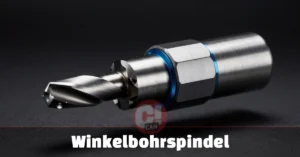 Winkelbohrspindel angle drilling spindle mounted on CNC machine with bevel gears visible at 90-degree angle, industrial workshop background