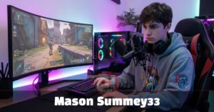 Mason Summey33 gaming content creator sitting at a dual monitor desk setup with microphone and RGB lighting.